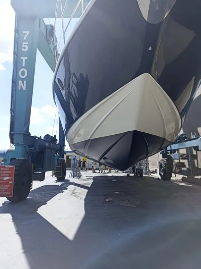  Yacht Photos Pics Azimut 62 yacht from 2007 in dry dock, supported by a 75-ton lift.