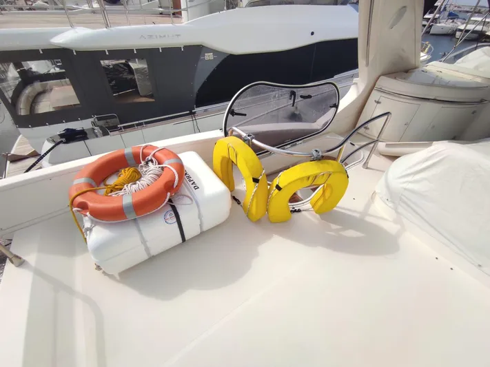  Yacht Photos Pics 2007 Azimut 62 yacht deck with life rings and safety equipment.