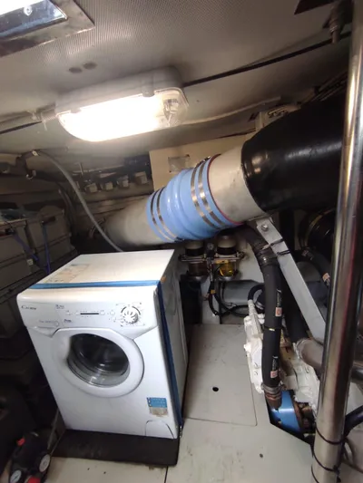  Yacht Photos Pics Engine room of 2007 Azimut 62 yacht with washing machine and ventilation system.