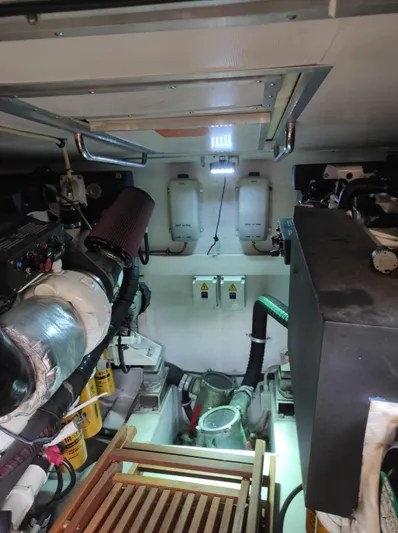  Yacht Photos Pics Engine room of a 2007 Azimut 62 yacht, showcasing mechanical components and equipment.