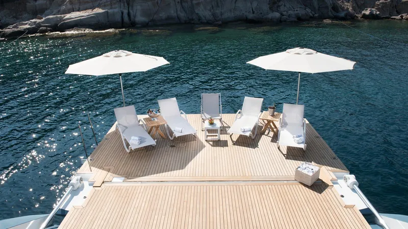 All About U Yacht Photos Pics Luxurious Ada Yacht 2018 deck with sun loungers and umbrellas by the sea.