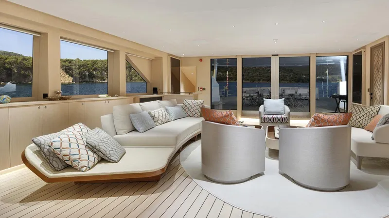 All About U Yacht Photos Pics Luxurious interior of 2018 Ada Yacht Sailing Yacht with elegant seating and scenic ocean views.