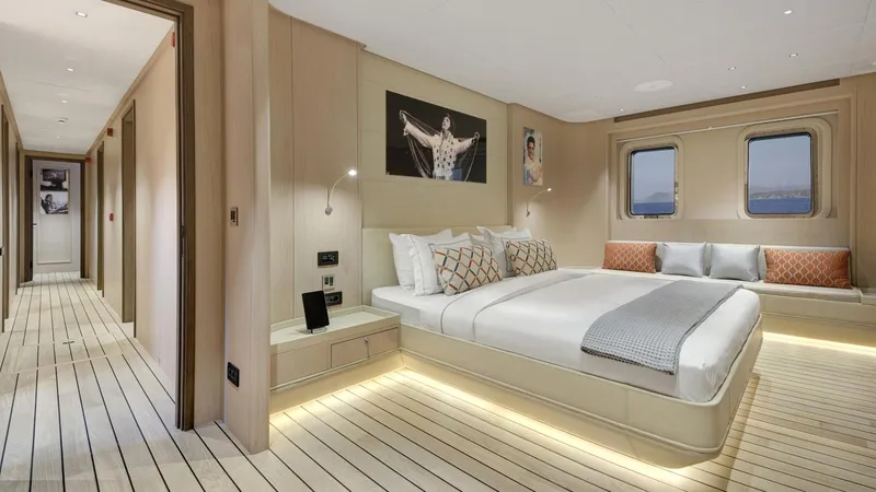 All About U Yacht Photos Pics Luxurious bedroom interior of 2018 Ada Yacht Sailing Yacht with modern decor and ambient lighting.
