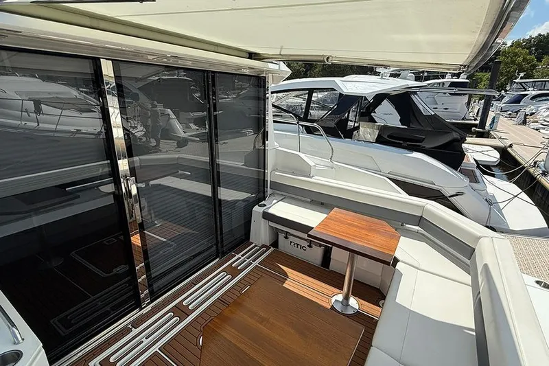  Yacht Photos Pics 2020 Cruisers Yachts 42 Cantius, featuring sleek deck and modern seating area.