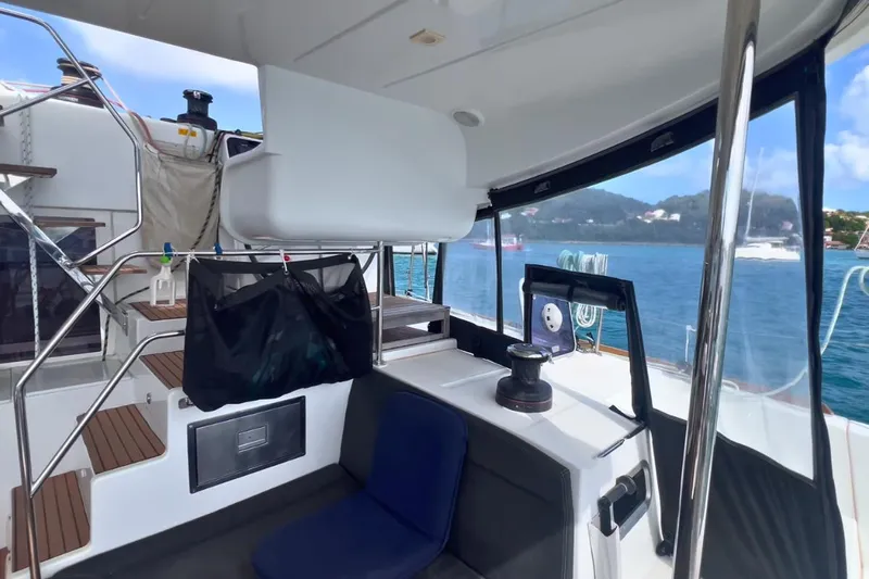 Sixtus Yacht Photos Pics 2016 Lagoon 450 s yacht interior with seating, stairs, and ocean view.
