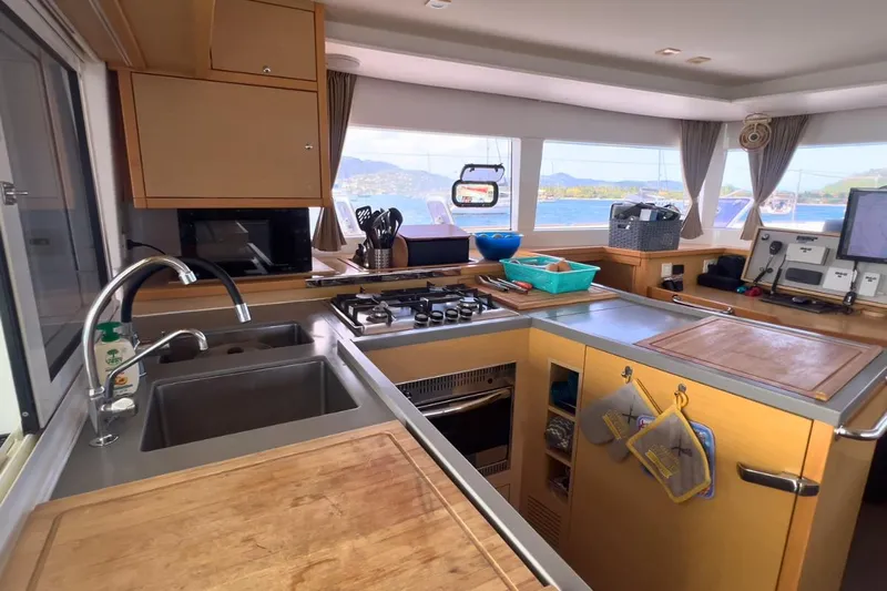 Sixtus Yacht Photos Pics Modern kitchen interior on 2016 Lagoon 450 s catamaran with ocean view.