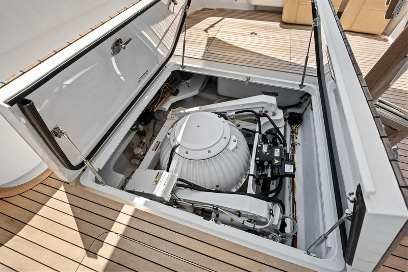 Sexy Lady Yacht Photos Pics 2017 Viking 62 Enclosed Bridge yacht engine compartment with advanced machinery and wiring.