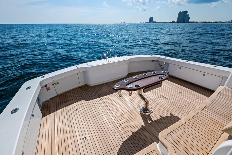 Sexy Lady Yacht Photos Pics 2017 Viking 62 Enclosed Bridge yacht deck with ocean view.