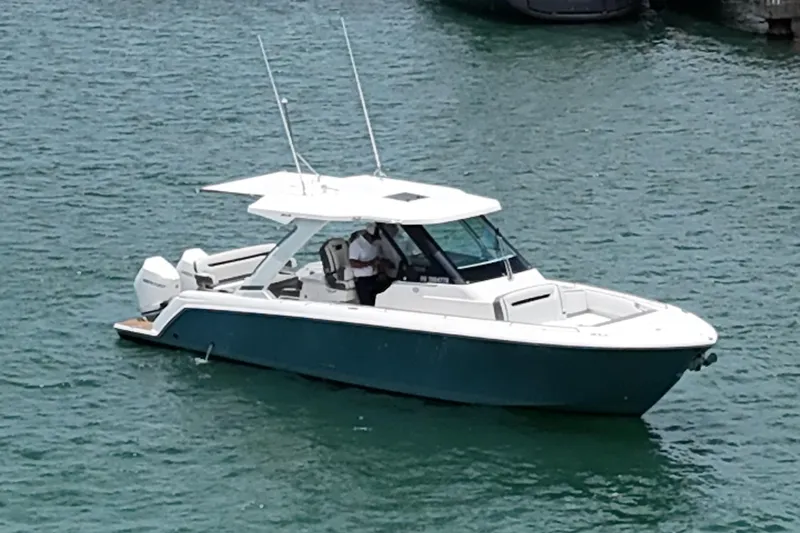  Yacht Photos Pics 2020 Tiara Sport 34 LS boat on calm water.