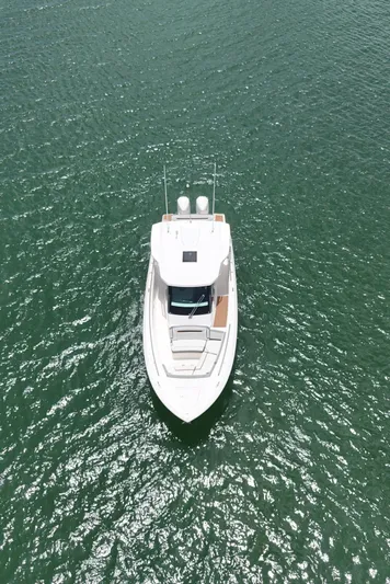  Yacht Photos Pics 2020 Tiara Sport 34 LS boat on open water, aerial view.