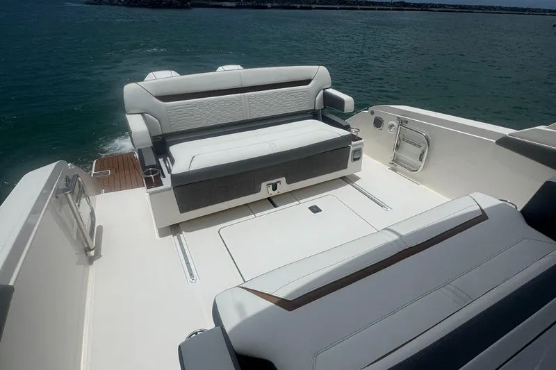  Yacht Photos Pics 2020 Tiara Sport 34 LS boat interior with luxurious seating on open water.
