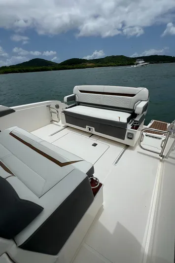  Yacht Photos Pics 2020 Tiara Sport 34 LS boat interior with luxurious seating, scenic water view.