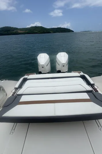  Yacht Photos Pics 2020 Tiara Sport 34 LS boat with dual Mercury engines on a calm sea.