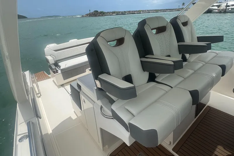  Yacht Photos Pics 2020 Tiara Sport 34 LS boat interior with luxurious seating and ocean view.