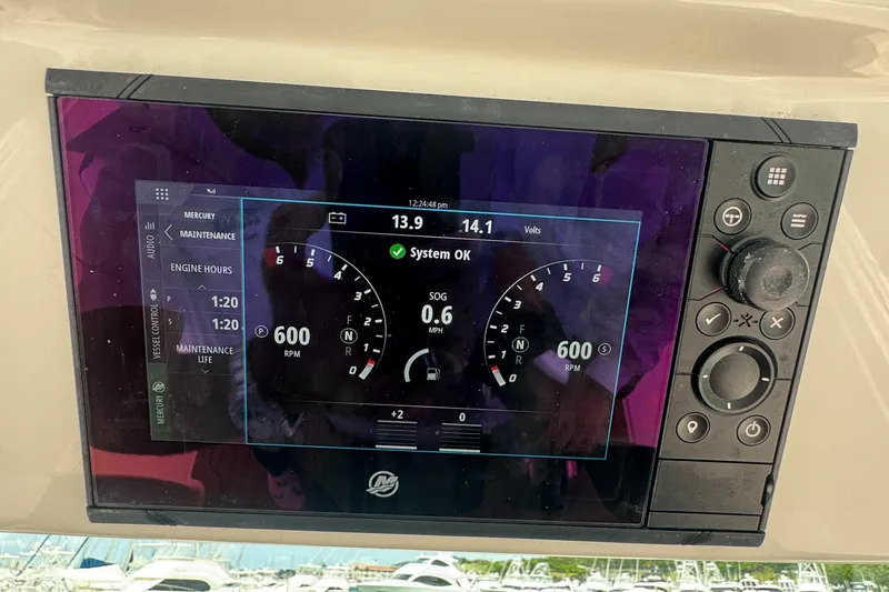  Yacht Photos Pics Dashboard display of a 2020 Tiara Sport 34 LS boat showing engine metrics.