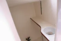 Compact bathroom interior of 1997 Custom IMS proto 33' boat.