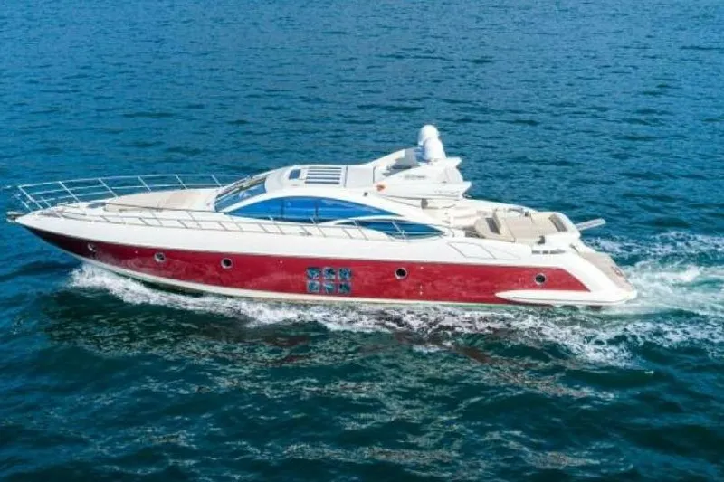  Yacht Photos Pics 2009 Azimut 68S yacht cruising on open water, showcasing sleek design and luxury.