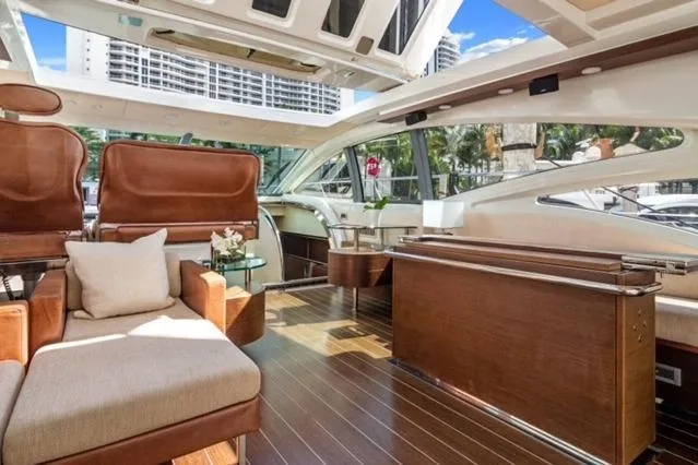  Yacht Photos Pics Luxurious interior of 2009 Azimut 68S yacht with elegant wood and leather furnishings.