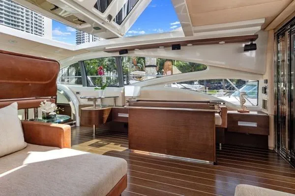  Yacht Photos Pics Luxurious interior of 2009 Azimut 68S yacht with elegant wood finishes and modern design.