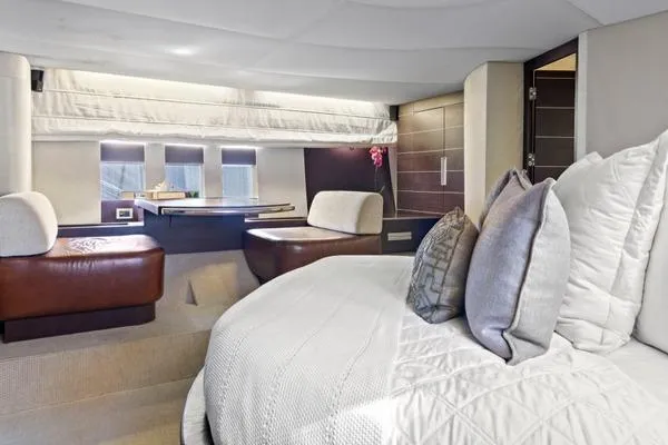 Yacht Photos Pics Luxurious interior of a 2009 Azimut 68S yacht with elegant bedding and seating.