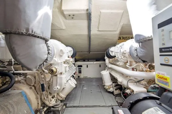  Yacht Photos Pics Engine room of 2009 Azimut 68S yacht, showcasing dual engines and mechanical components.