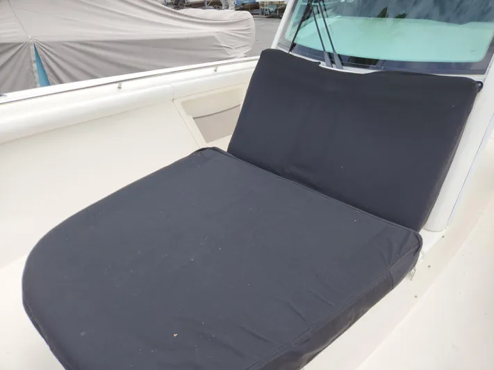 Outrageous Yacht Photos Pics 2014 Boston Whaler 350 Outrage boat with cushioned seating area.