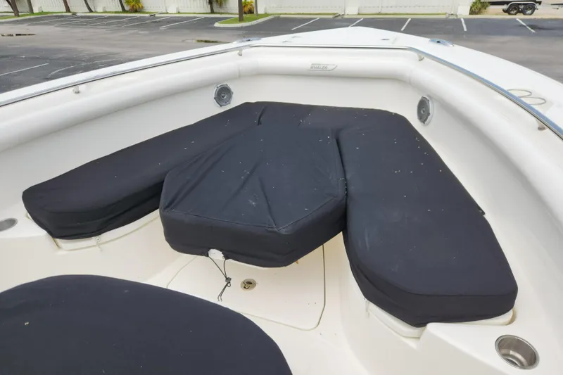 Outrageous Yacht Photos Pics 2014 Boston Whaler 350 Outrage bow seating area with black cushions.