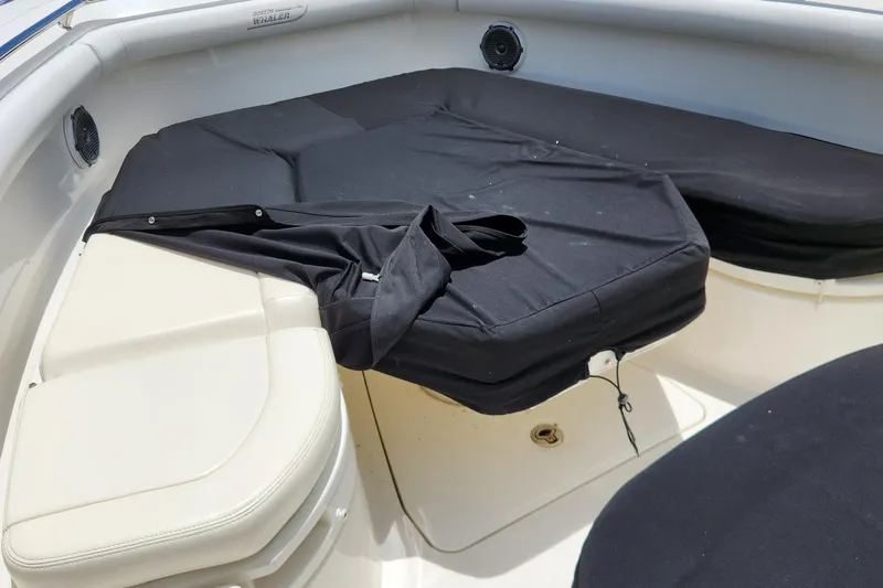 Outrageous Yacht Photos Pics 2014 Boston Whaler 350 Outrage boat interior with black seat covers.