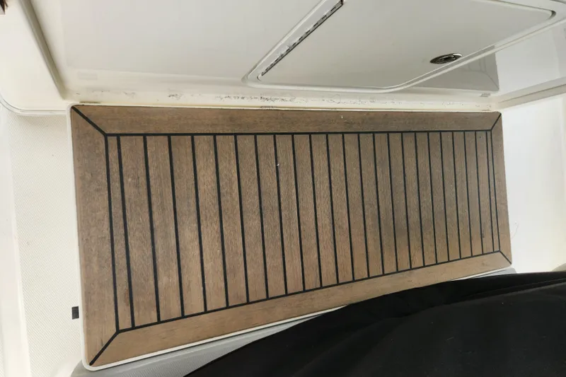 Outrageous Yacht Photos Pics Teak deck of a 2014 Boston Whaler 350 Outrage boat.