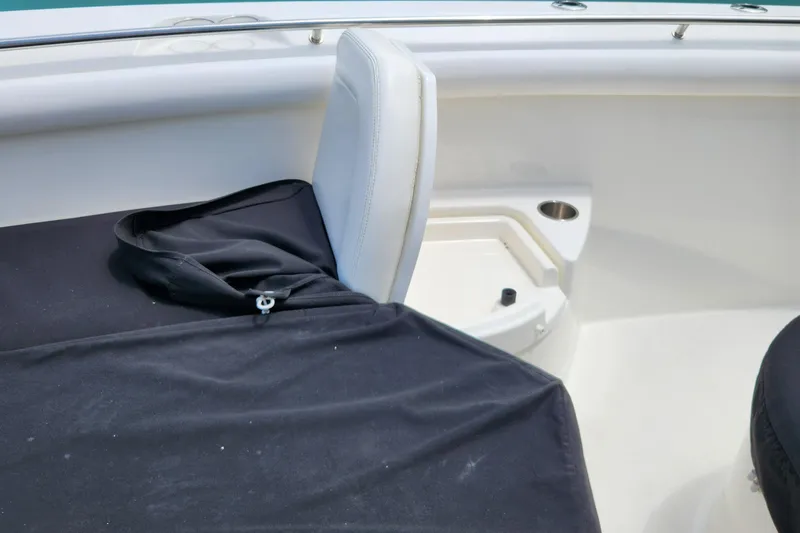 Outrageous Yacht Photos Pics 2014 Boston Whaler 350 Outrage boat interior seating and storage area.