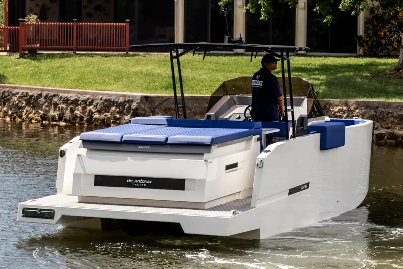  Yacht Photos Pics 2024 De Antonio Yachts D28 Open cruising on a calm waterway, showcasing sleek design and comfort.