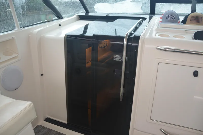 Sea Time Yacht Photos Pics 2001 Tiara Yachts 4100 Open, featuring cabin entrance and seating area.