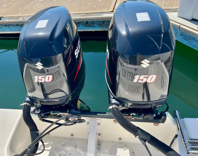 Empty Nest Yacht Photos Pics Twin Suzuki 150 outboard engines on a 2012 Seaswirl Striper 2601 Walkaround boat.