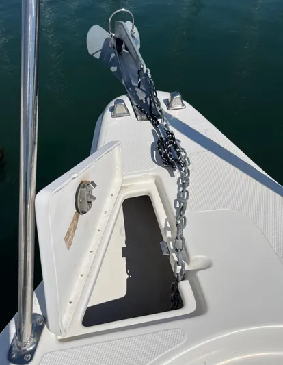 Empty Nest Yacht Photos Pics Open anchor locker on 2012 Seaswirl Striper 2601 Walkaround boat with chain and anchor.