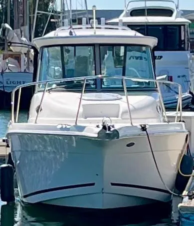 Empty Nest Yacht Photos Pics 2013 Seaswirl Striper 2601 Walkaround boat docked at marina.