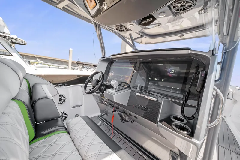  Yacht Photos Pics 2021 Nor-Tech 390 Sport Center Console interior with modern dashboard and seating.