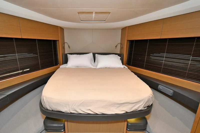 "about Time" Yacht Photos Pics Luxurious bedroom interior of 2016 Princess 52 Flybridge Yacht with modern design.