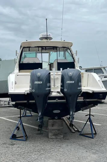Hot Pursuit Yacht Photos Pics 2016 Pursuit 325 DC boat with dual Yamaha 300 engines on stands.