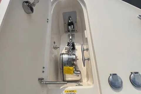  Yacht Photos Pics 2023 Grady-White Canyon 306 boat anchor compartment with winch and hardware.