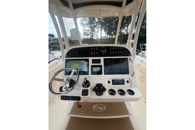  Yacht Photos Pics 2023 Grady-White Canyon 306 helm with advanced navigation and control systems.