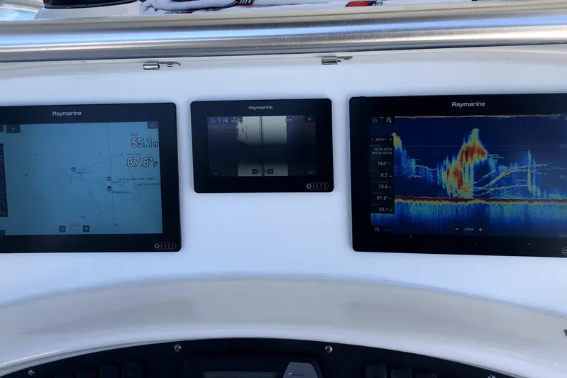  Yacht Photos Pics Control panel of a 2005 Boston Whaler 320 Outrage with Raymarine displays.