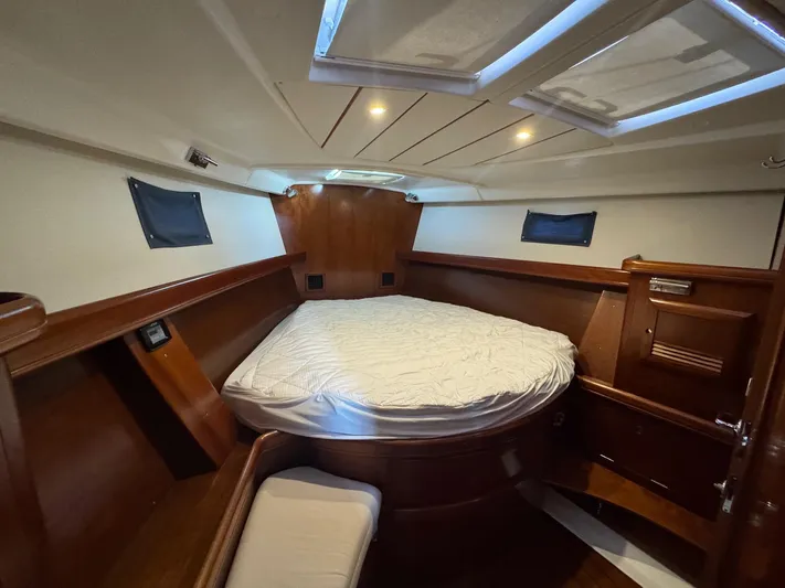 Sanctuary Yacht Photos Pics Luxurious cabin interior of 2005 Beneteau Oceanis Clipper 473 yacht with wooden finish.