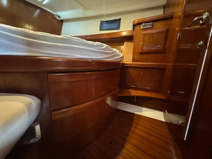 Sanctuary Yacht Photos Pics Luxurious wooden interior of 2005 Beneteau Oceanis Clipper 473 yacht cabin.