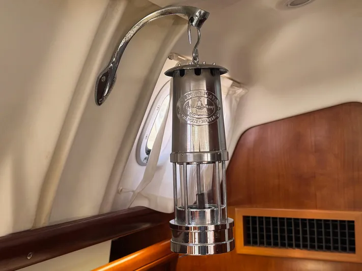 Sanctuary Yacht Photos Pics Hanging lantern inside 2005 Beneteau Oceanis Clipper 473 yacht cabin.