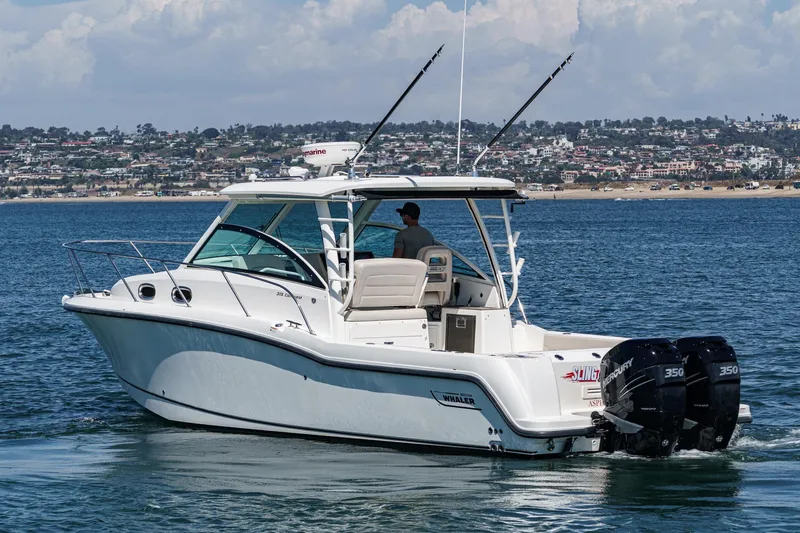Slingshot Yacht Photos Pics 2018 Boston Whaler 315 Conquest boat on water, featuring twin Mercury engines.