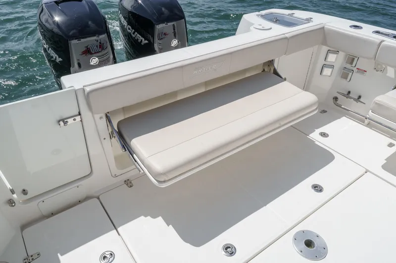 Slingshot Yacht Photos Pics 2018 Boston Whaler 315 Conquest boat with foldable seating and dual Mercury outboard engines.