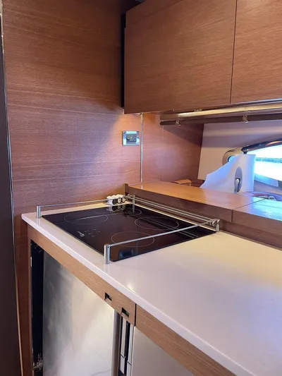  Yacht Photos Pics Modern kitchen area in a 2013 Azimut Atlantis 54 yacht.