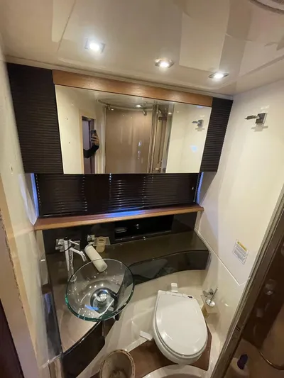  Yacht Photos Pics Modern bathroom in 2013 Azimut Atlantis 54 yacht with glass sink and large mirror.