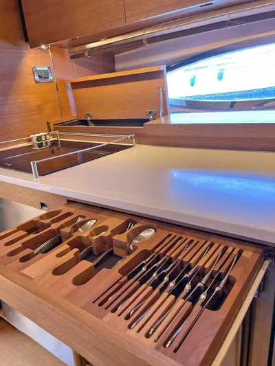  Yacht Photos Pics Modern kitchen area in 2013 Azimut Atlantis 54 yacht with organized cutlery drawer.