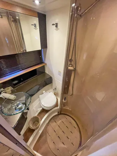  Yacht Photos Pics 2013 Azimut Atlantis 54 yacht bathroom with modern fixtures and glass sink.